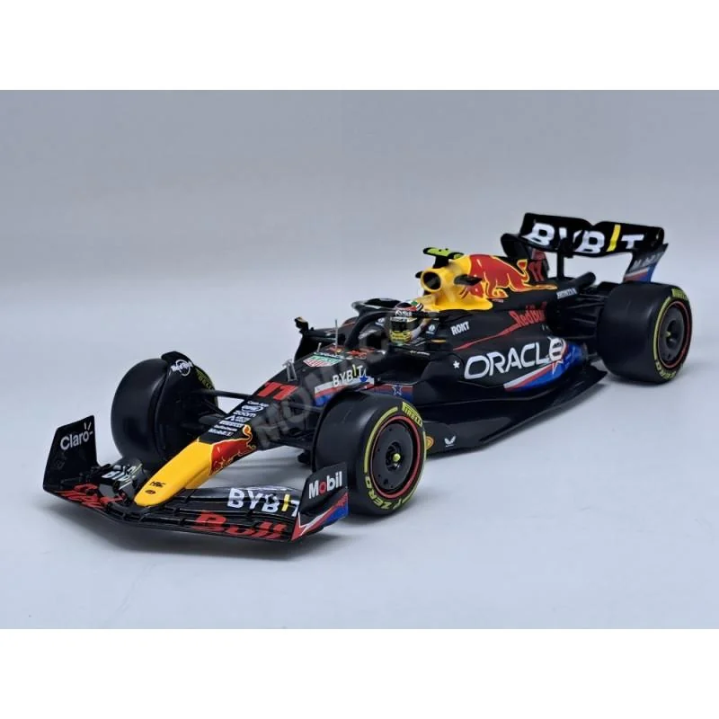 RED BULL F1 RB19 TEAM ORACLE RED BULL RACING 11 SERGIO PEREZ GRAND PRIX AUSTIN 2023 4EME (PACKAGING PREMIUM AVEC CASQUE) Die-cas